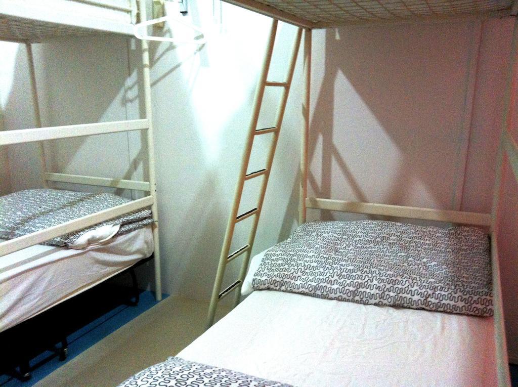 Drop Inn Singapur Zimmer foto